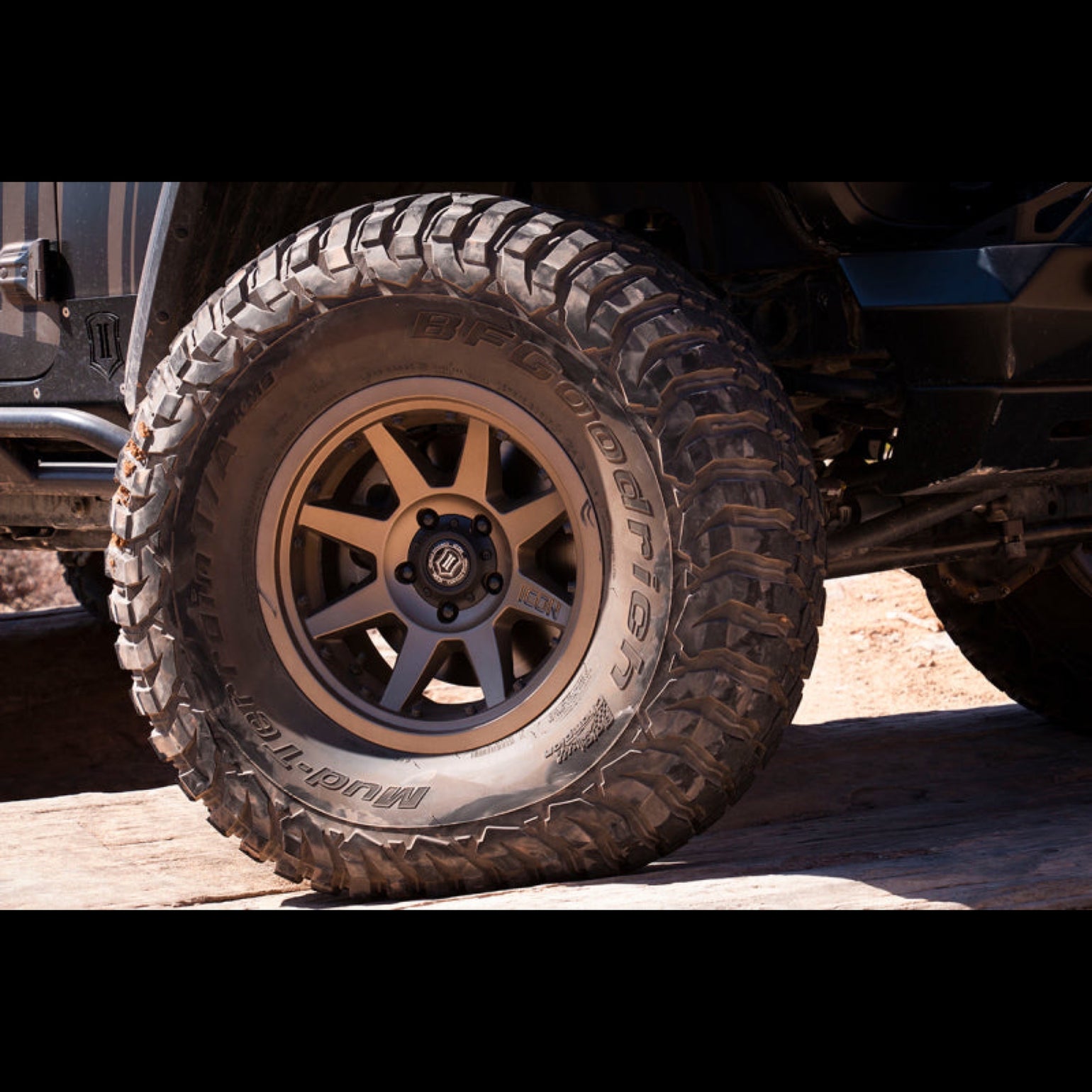 Icon Rebound bronze wheel on a dirt road