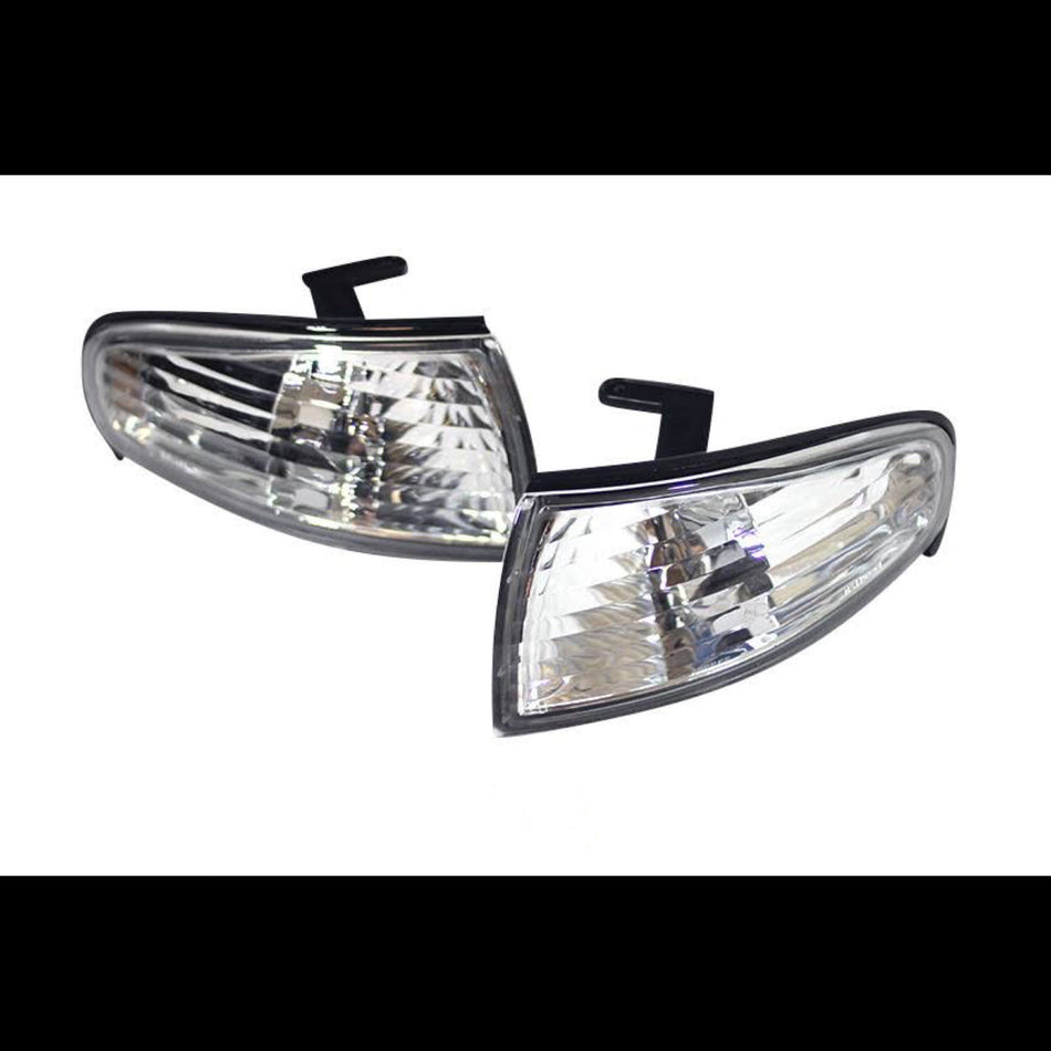 S14 Zenki 240sx clear corner lights with a white background