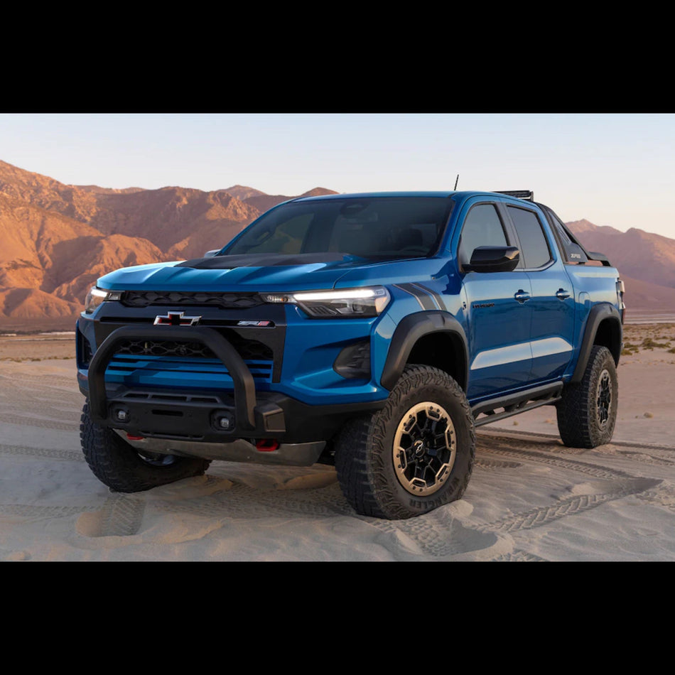 Blue Chevrolet Colorado zr2 on a dirt road in Joshua tree