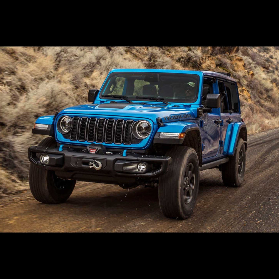 Blue Jeep Wrangler JL Rubicon on a dirt road