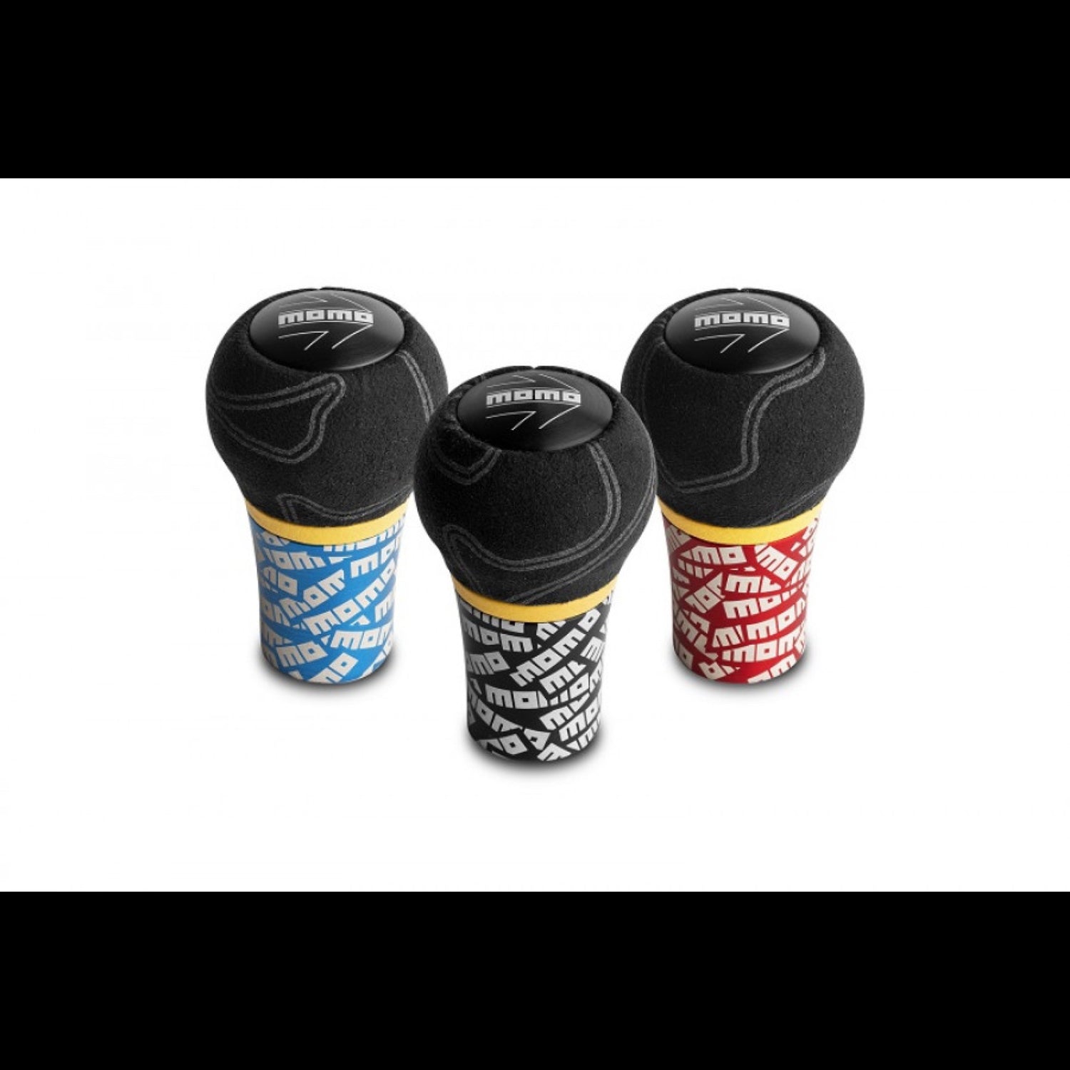 MOMO black leather shift knobs in blue, yellow, and red.