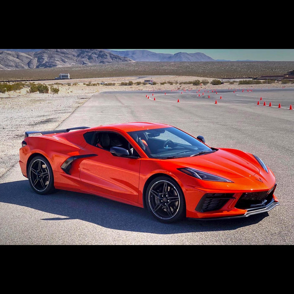 Red Chevrolet C8 Corvette at buttonwillow race track