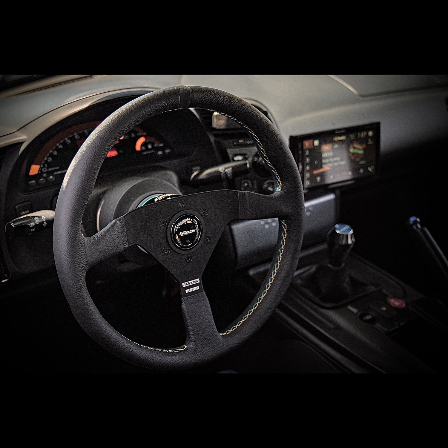 Momo x Greddy collaboration Monte Carlo steering wheel in a Honda s2000