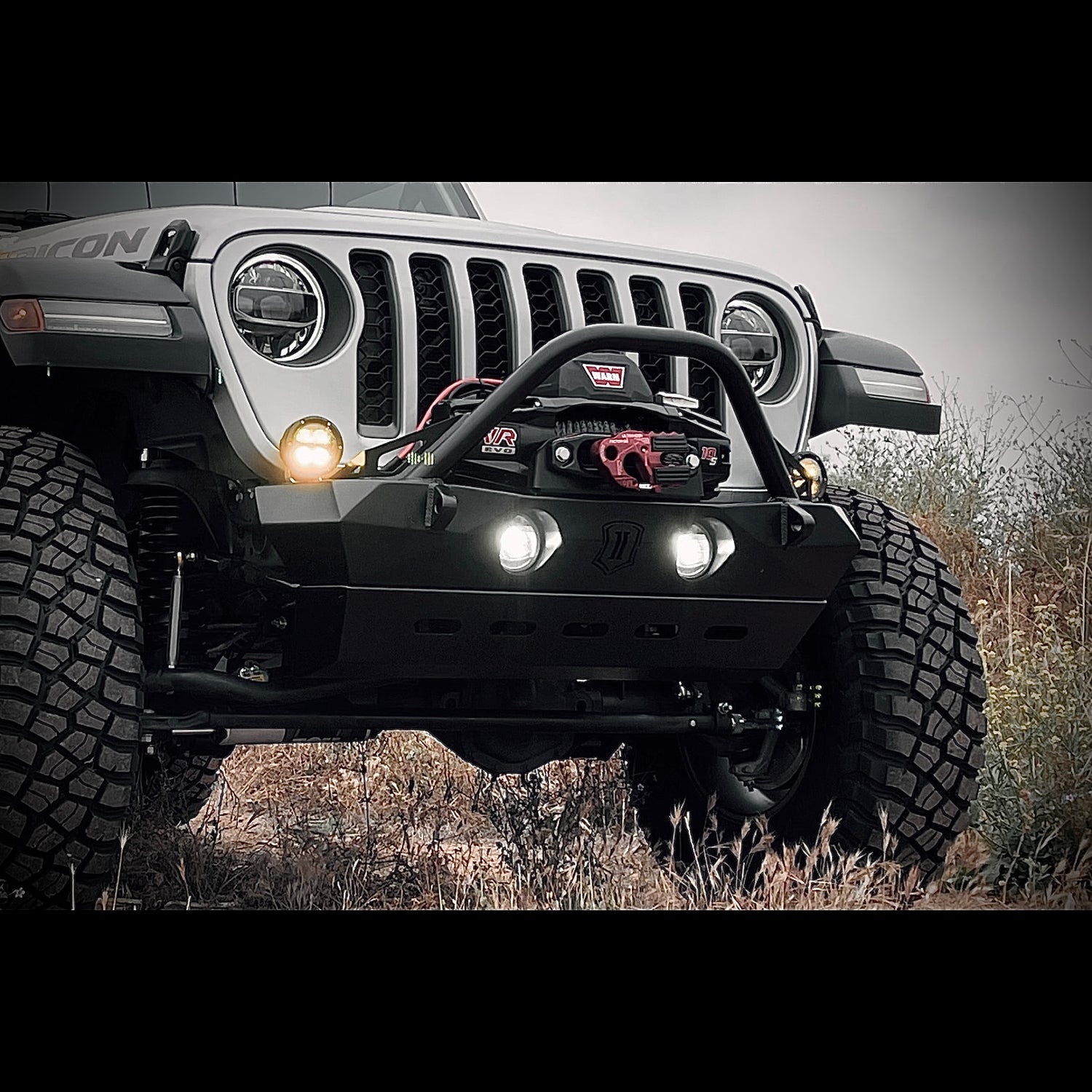 Icon Impact front bumper in black on a  silver Jeep Rubicon Gladiator