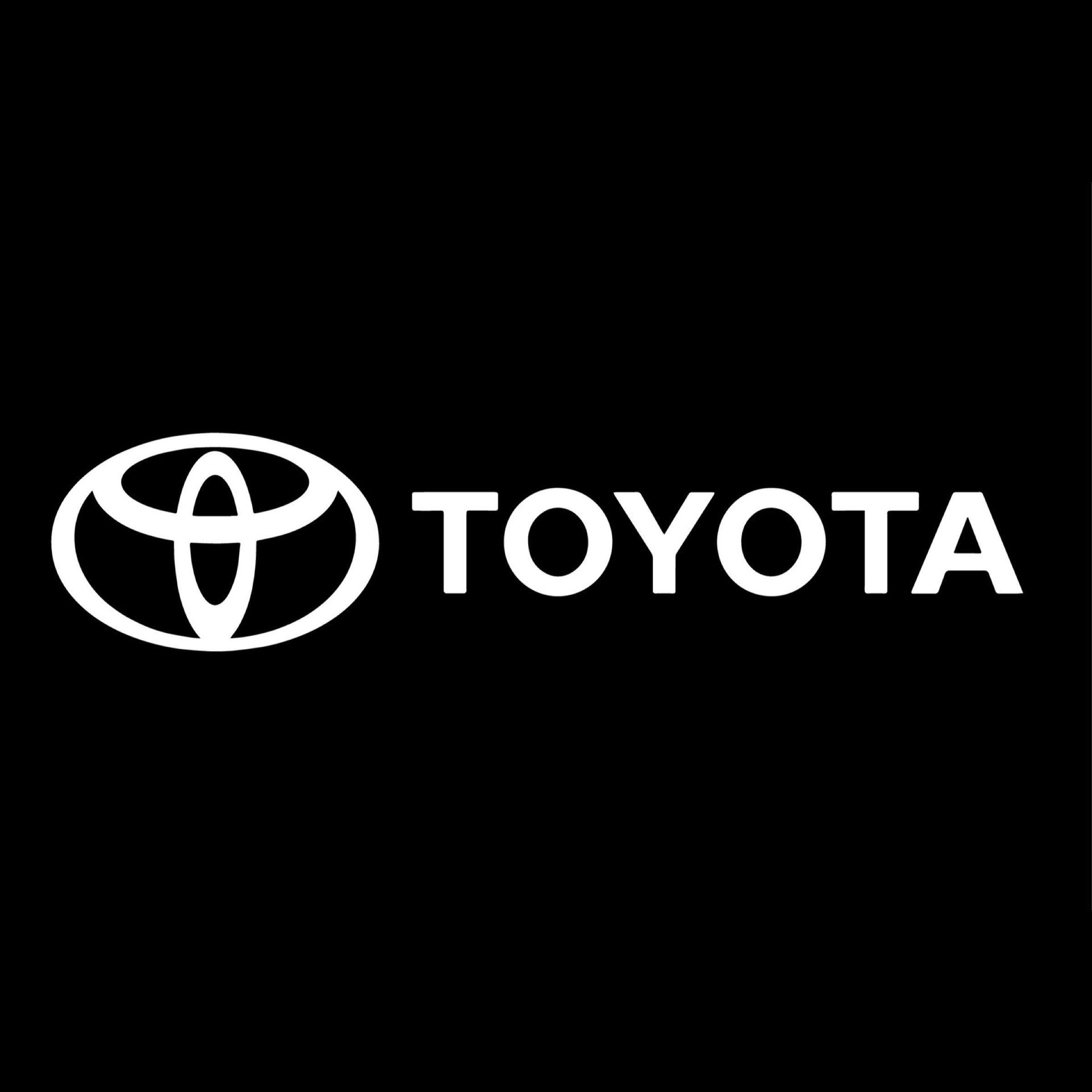 Toyota logo in white with black backdrop